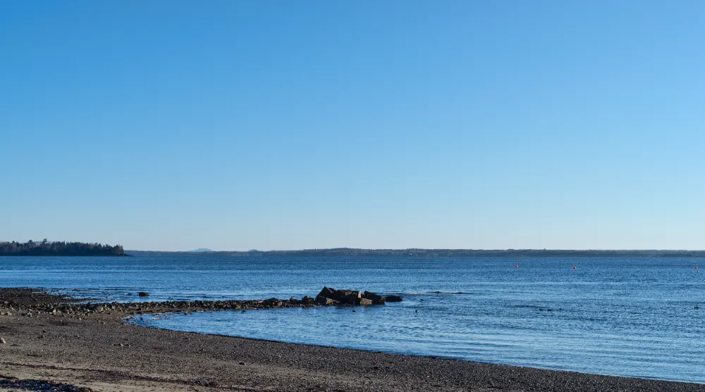 Calm coastal shoreline in Northport, Maine, representing Restorations Unlimited’s bathroom remodeling services